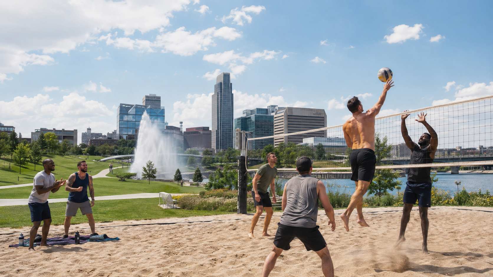 Program participants playing sand volleyball