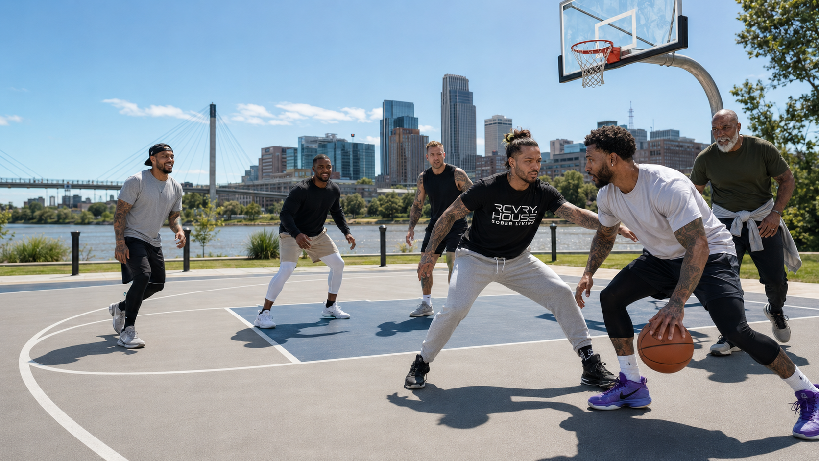 Men playing basketball at the Omaha riverfront